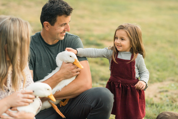 Fall is in full swing here in NJ, my first Fall Family session with Anna and Adam at their Farm House in Hackettstown NJ. Anna and Adam recently purchased their dream farm house on a 4 acres of land. This family of four now has chickens, ducks, birds, cats, a dog, sheep and plans to add many more to the list in the future. I had the honor of visiting Anna and Adam and their two beautiful children at their Farm the other day. I got much need vitamin D walking around the property, enjoying the foliage, running around with their kids and meeting all the farm animals. I sincerely enjoy photographing families now because there are no dull moments with kids, every moment is perfect! Fall family session at Anna and Adam’s Farm at Hackettstown NJ photographed by Karis from HeyKaris.